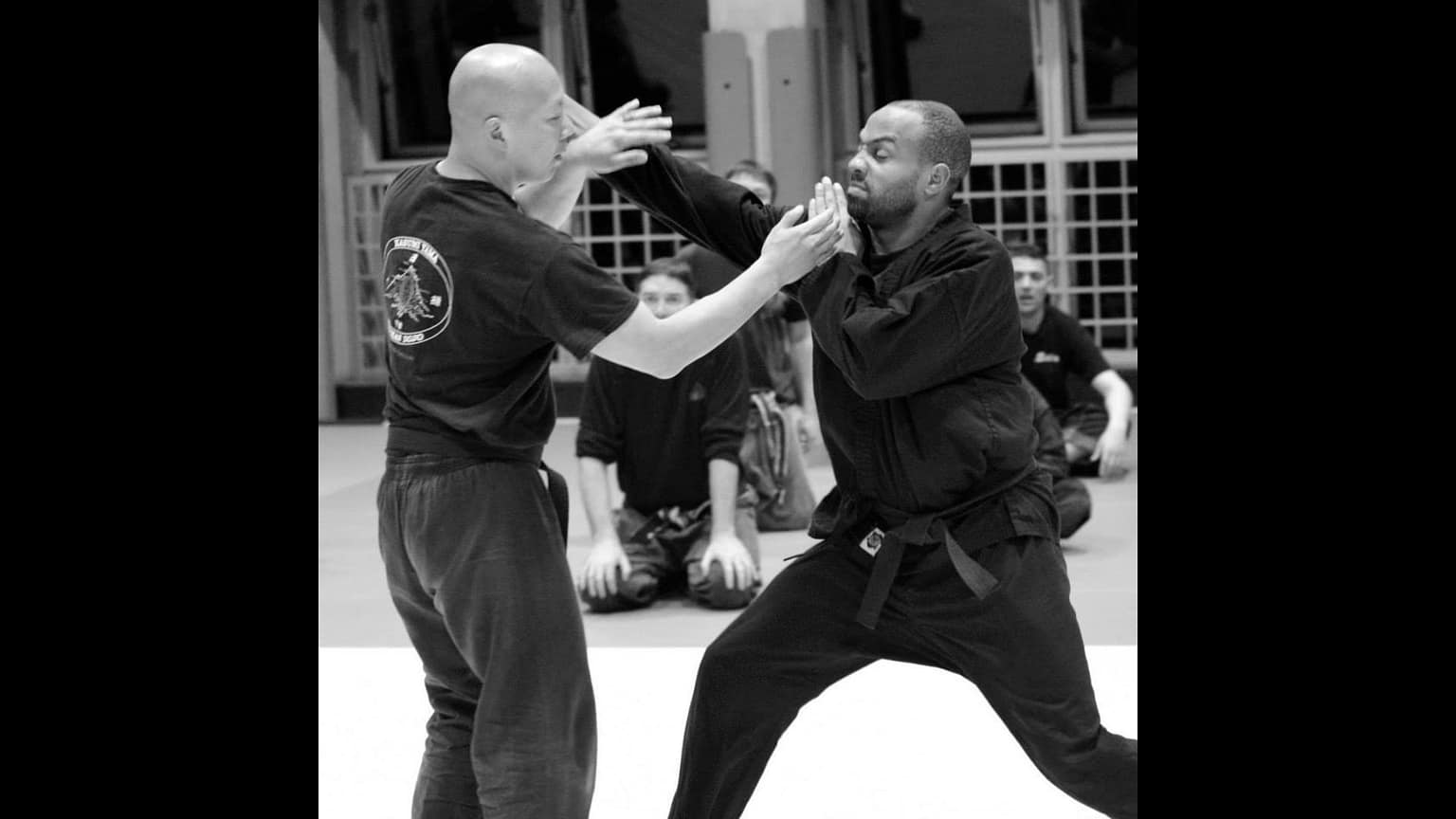 Jeff demonstrating a technique at the Budokan in Ayase, Japan with his student, Naim Brown.